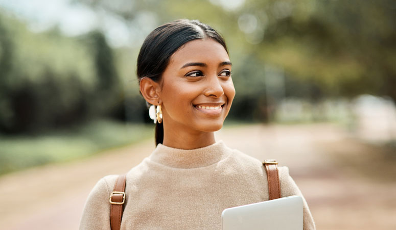 business woman walking outside