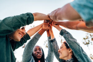 diverse group high fiving