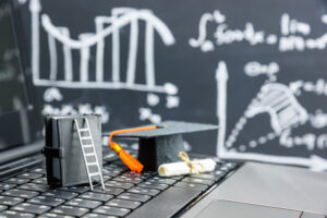 grad cap on keyboard