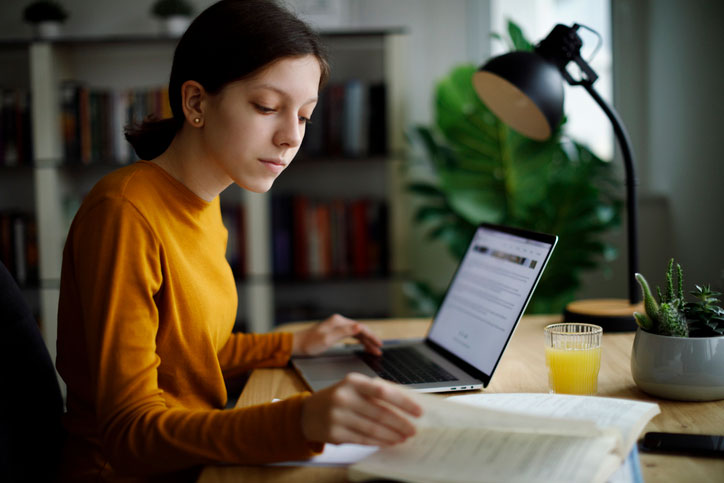 young woman studying online