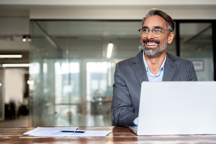 older man on computer