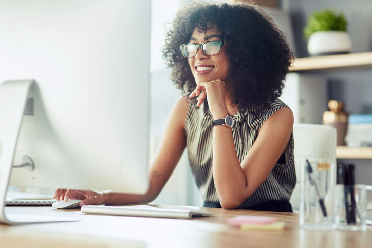 happy woman at computer