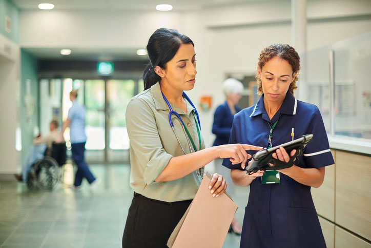 nurse mba talking in hall