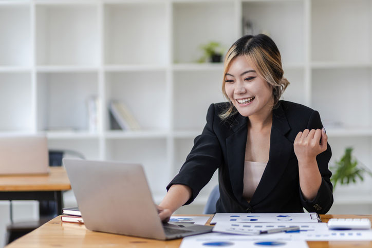 young woman checking her computer